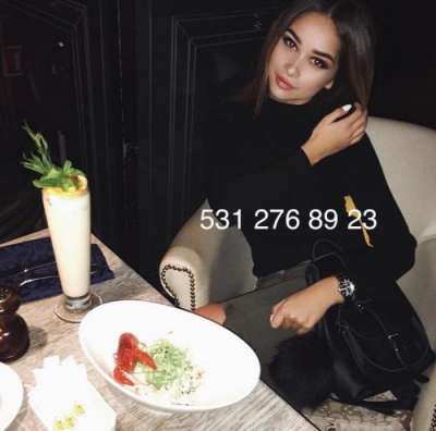 Mersin Mezitli'den Etkileyici ve Sakin Görünümüyle Büyüleyen Escort Bayan: Kızıl Saçlı, Fi