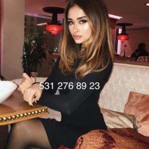 Mersin Mezitli'den Etkileyici ve Sakin Görünümüyle Büyüleyen Escort Bayan: Kızıl Saçlı, Fi