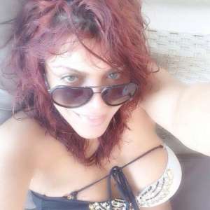 Mersin Mezitli: Kızıl Saçlı ve Bakımlı Escort Bayan'ın Asil Stili: 161cm, 72 Kg İnce Güzel