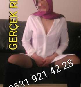 Zarif Stili ve Çekiciliği ile Mersin'den Kumral Saçlı Escort Kız: 57kg, 171cm'lik Büyüleyi